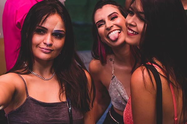 Women celebrating a bachelorette party with champagne