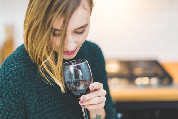 woman with a glass of wine 